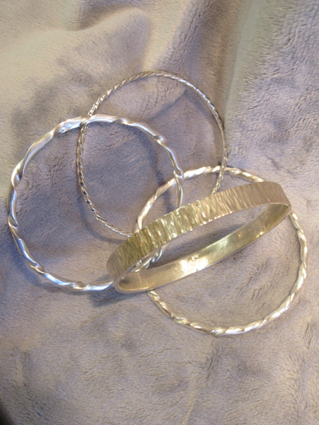 4 sterling silver bangles